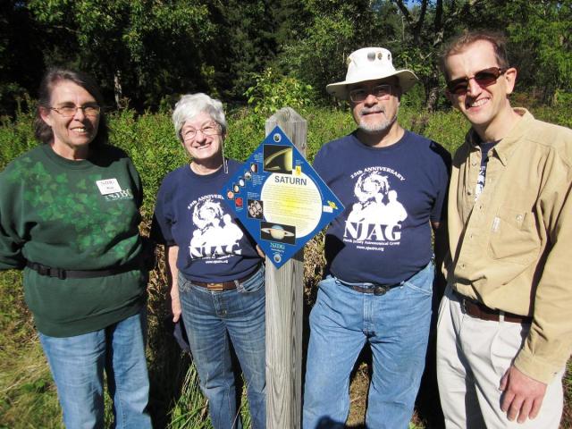 NJAG Members and the Saturn monument